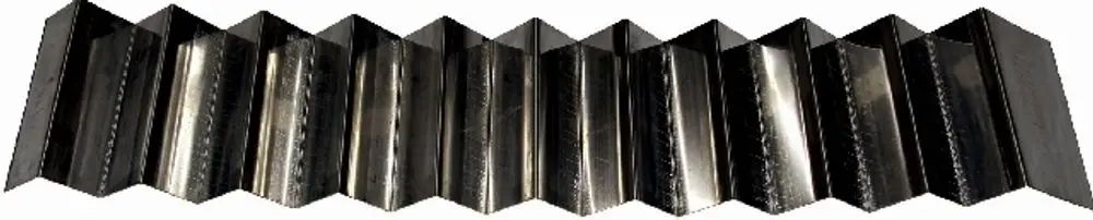 Turbolator von Wolf, aus Metall mit gewellter Form, für den Einsatz im MK-1-180. Sichtbar sind mehrere parallel angeordnete Wellen.